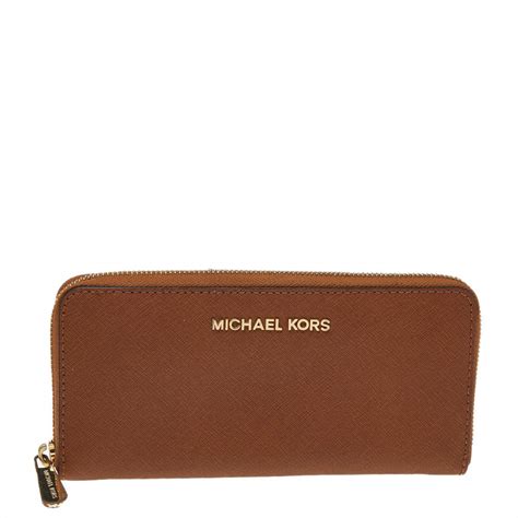 michael kors signature saffiano zip around wallet brown|Michael Kors travel continental wallet.